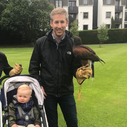 Doctor Hall holding a large bird