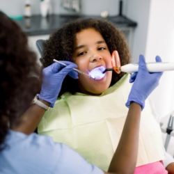 Dentist replacing a lost filling
