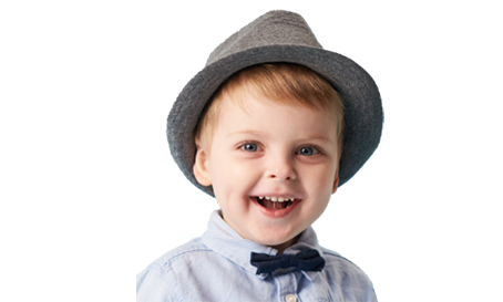 Child smiling after sedation dentistry