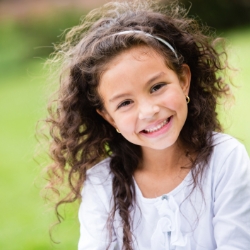 Child smiling after visiting the children's dentist