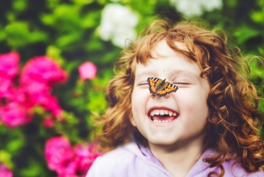 Child smiling after her children's dental checkup and teeth cleaning visit