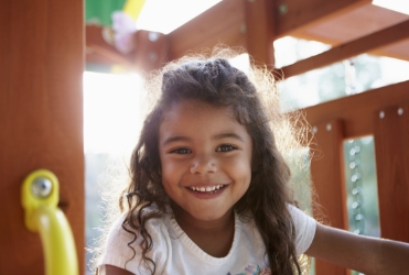 Little girl with healthy smile after restorative dentistry