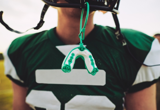 Teen with athletic mouthguard