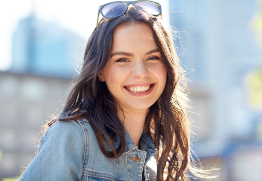 Teen smiling after visiting the dentist