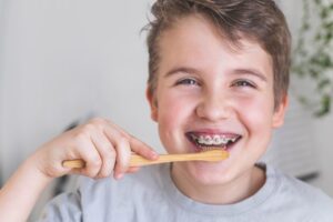 Happy preteen boy with braces
