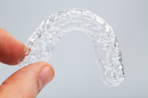 Close up of clear plastic retainer